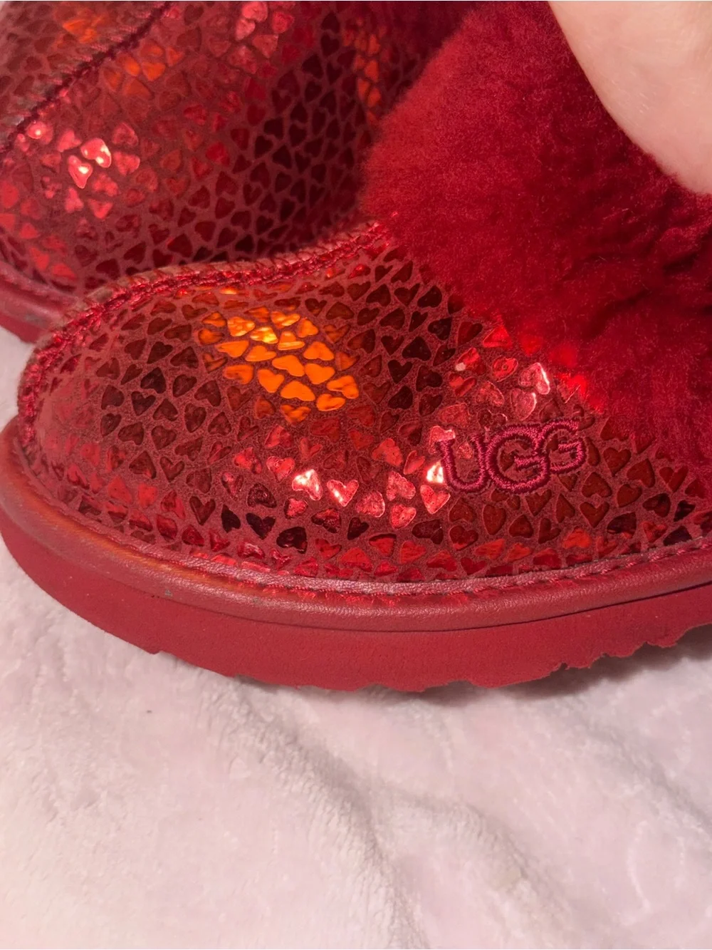 Kids UGG Red Metallic Faux-Fur Slide with hearts
